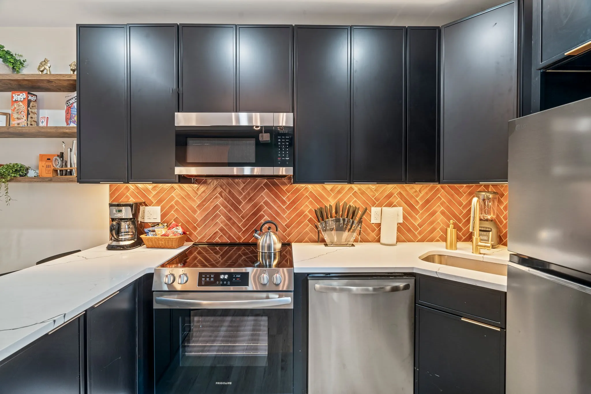 Enjoy breakfast at the bar or a full meal prep. This fully-stocked kitchen has plenty of space and all the essentials you'll want.