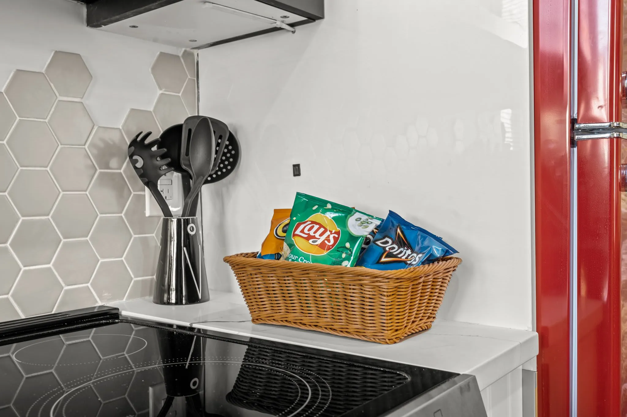 Enjoy complimentary snacks in a cheerful basket perfect for cravings or quick bites. Treats await you after exploring or relaxing in the living room. This thoughtful touch adds care and comfort to your stay, making you feel right at home.
