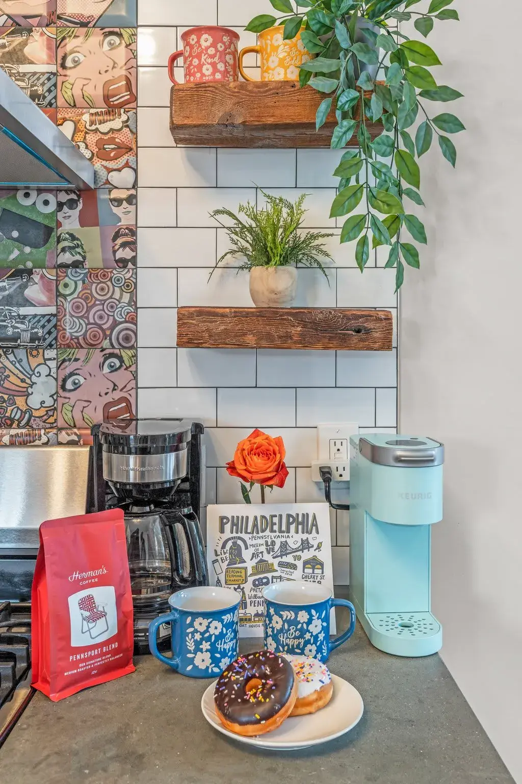 Wake up to fresh local coffee with both drip and Keurig options—colorful mugs and donuts make mornings here extra sweet.
