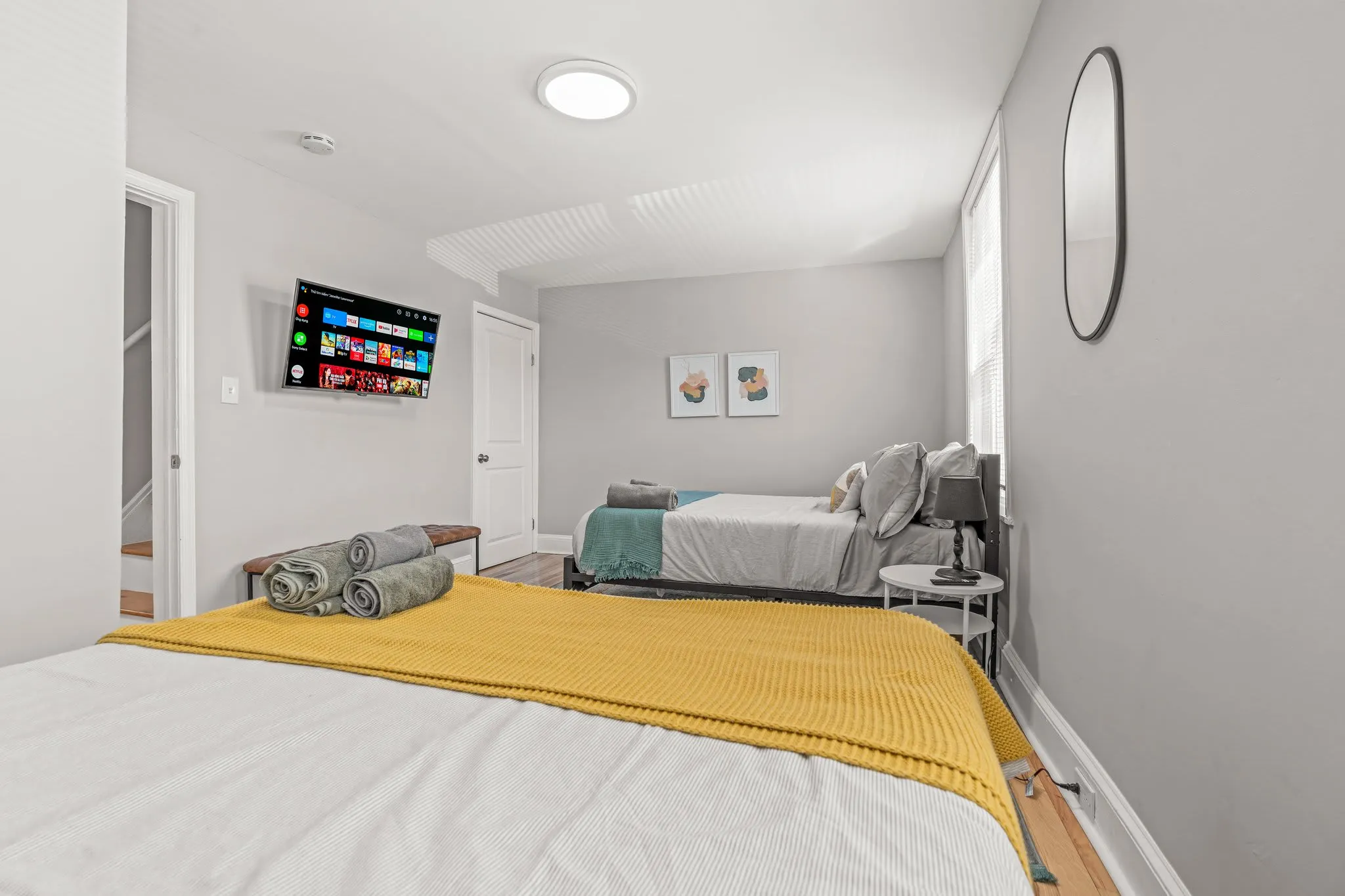 Fresh, airy, and designed for comfort—cozy blankets and modern décor make it a relaxing retreat.