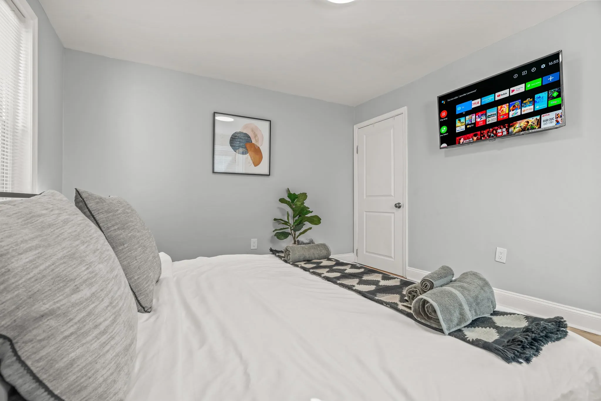 Unwind in bed while streaming your favorites on the large smart TV—comfort and convenience combined.