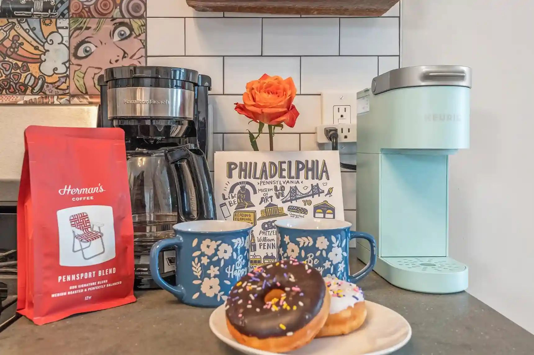 A thoughtful setup with coffee, mugs, and Philly flair—everything you need to start your day off right.