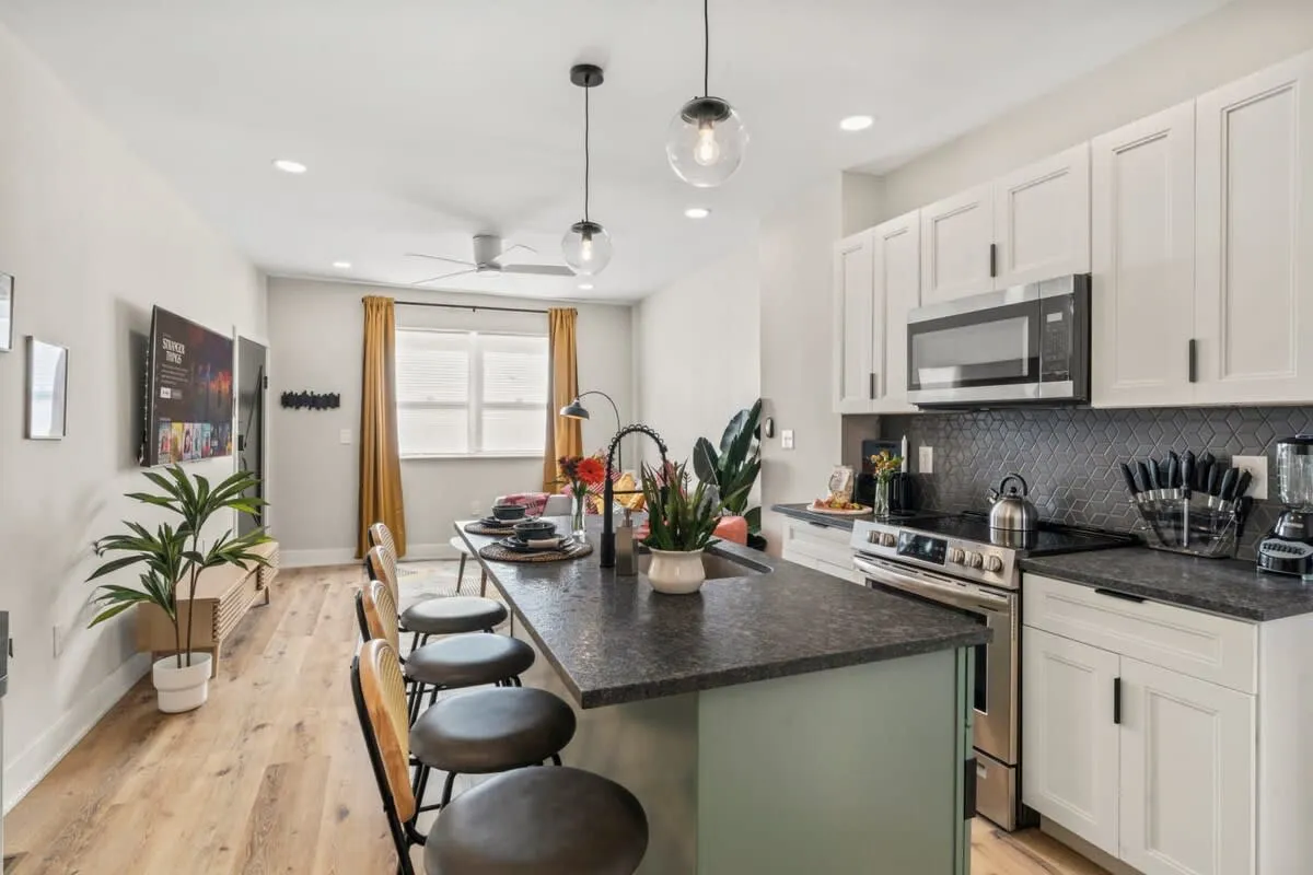 Open flow, vibrant details, and modern touches make this space effortlessly livable.