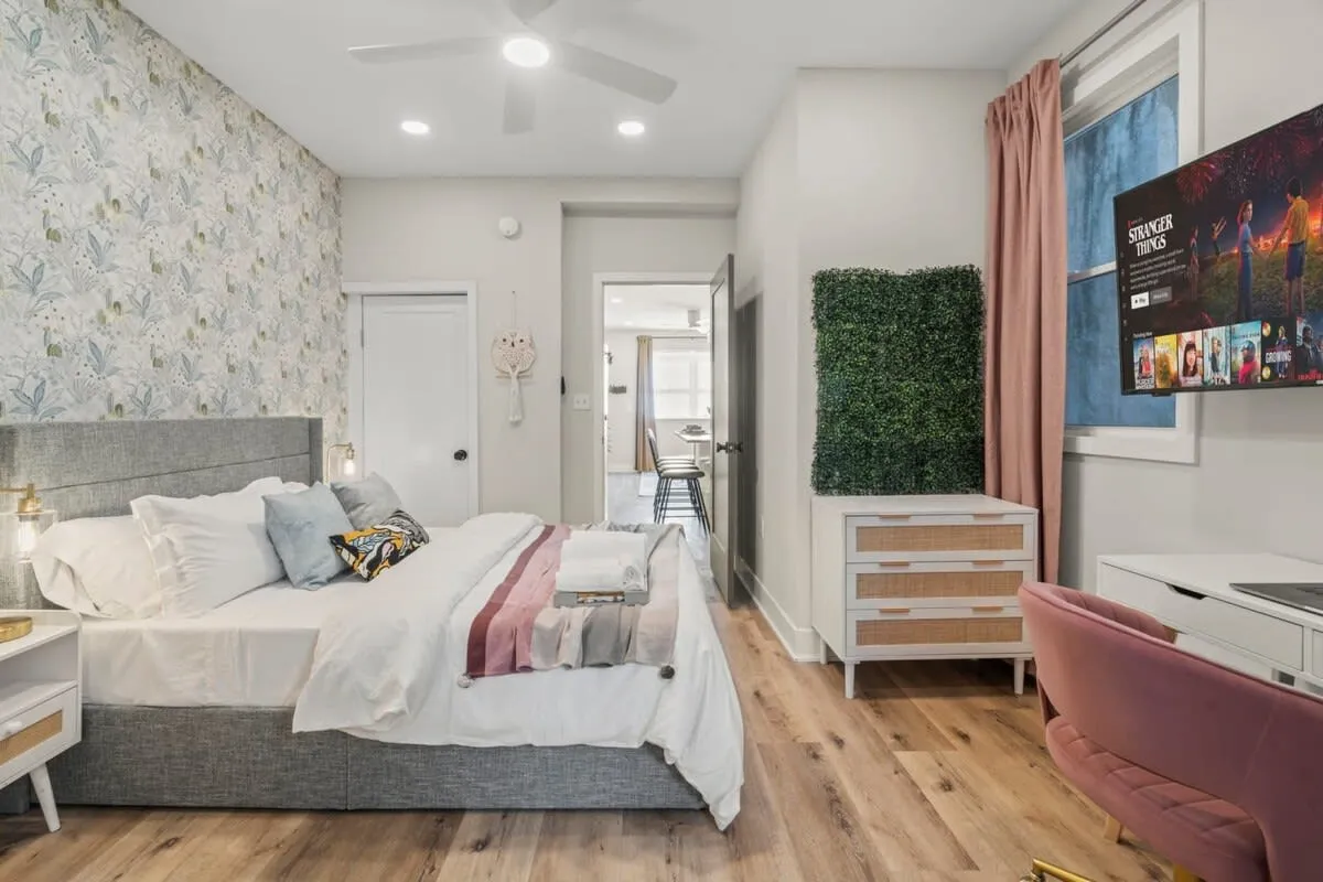 Soft textures, designer wallpaper, and a dedicated workspace—your peaceful Passyunk retreat to rest or recharge.