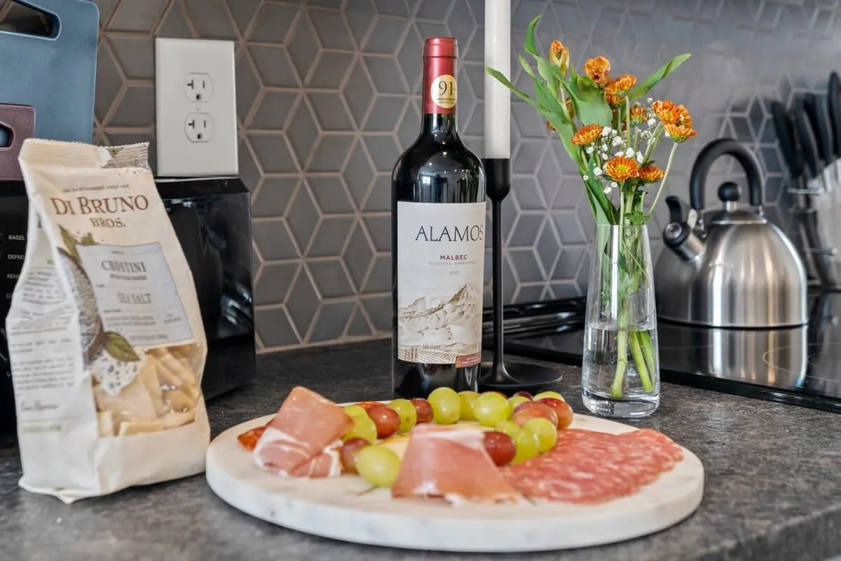 A warm welcome awaits—cheers to comfort, design, and your new favorite Philly stay. (wine and cheese board not included- sorry! ;) )