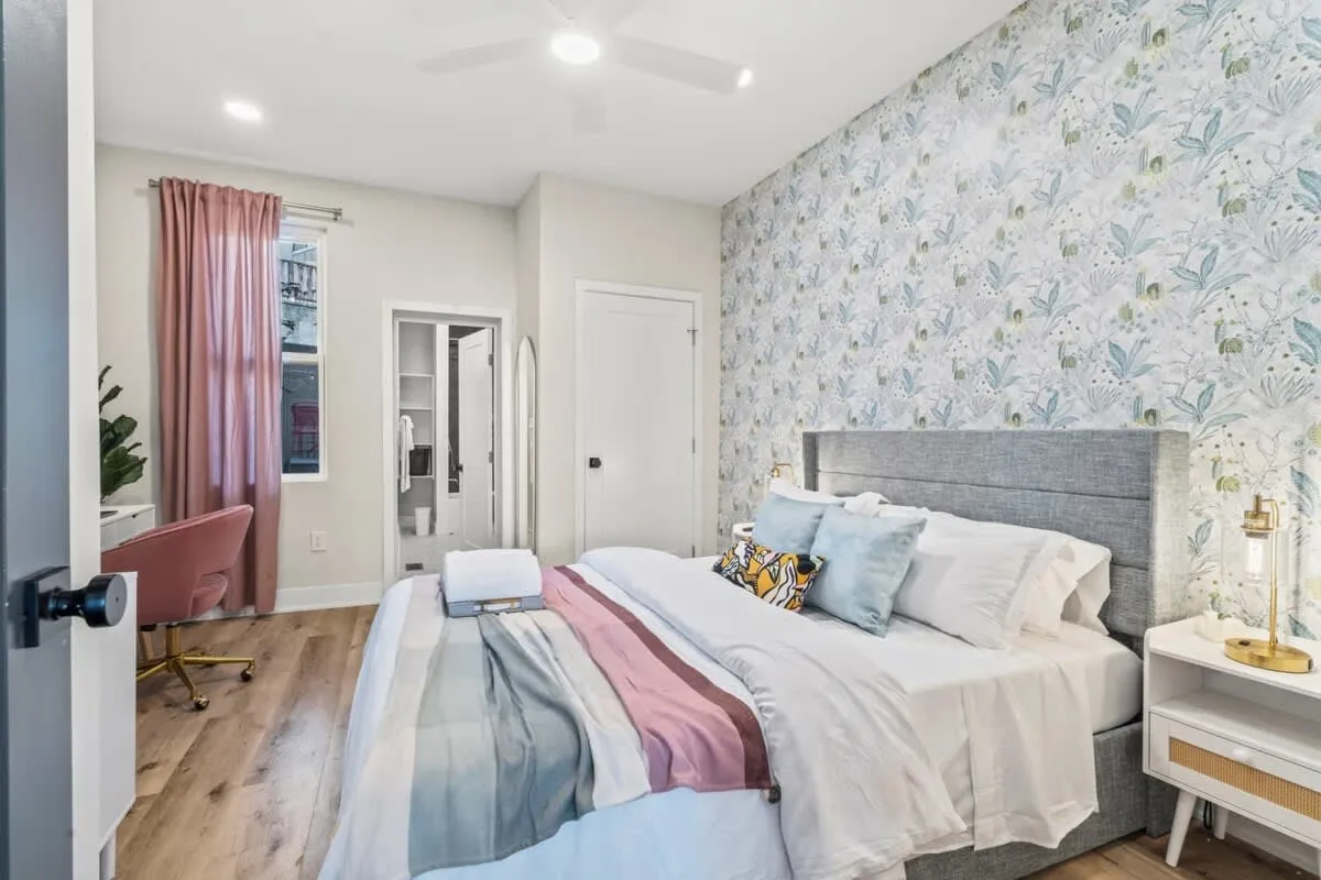 Soft textures meet bold style—drift off in a serene bedroom designed for total comfort and calm.