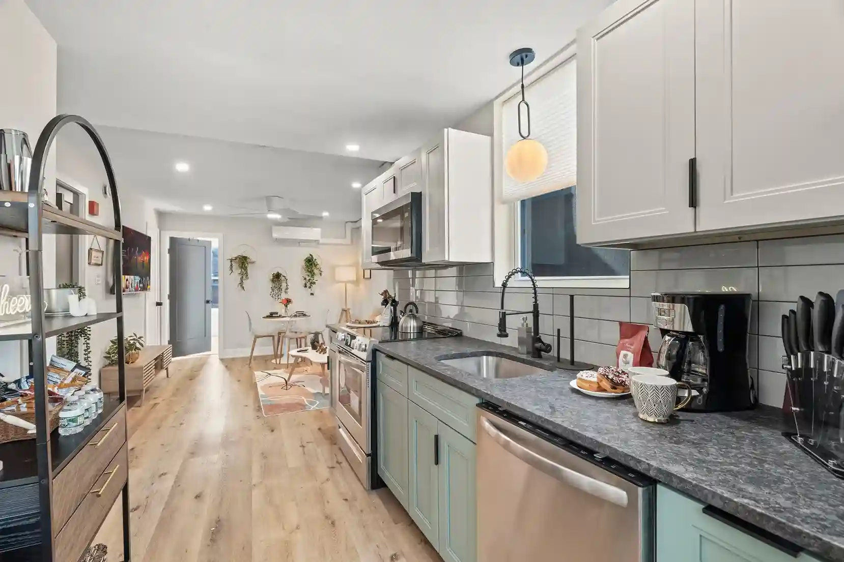 Open layout connects kitchen to living—perfect for cooking, dining, and gathering together.