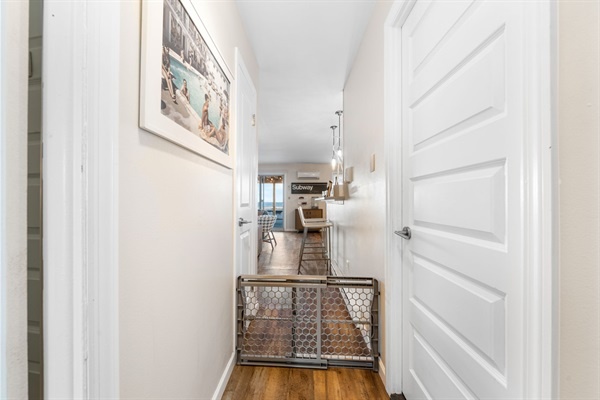 This hallway opens right up to ocean views, coastal charm, and easy-breezy living.