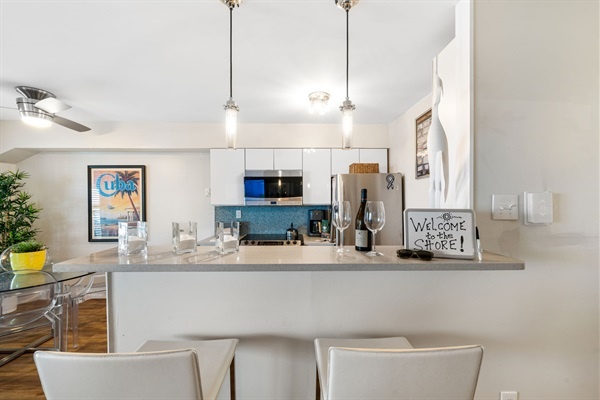 Beachy hues meet modern comfort—your perfect setup for coastal cooking and casual gatherings.