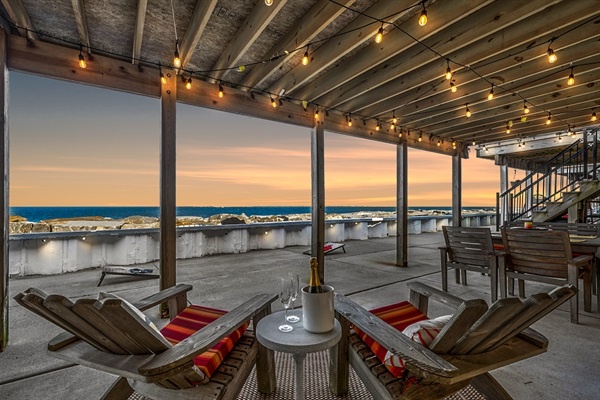 Pour a glass, sink into the chairs, and take in that Wildwood sunset. Your front-row seat to the waves is waiting.