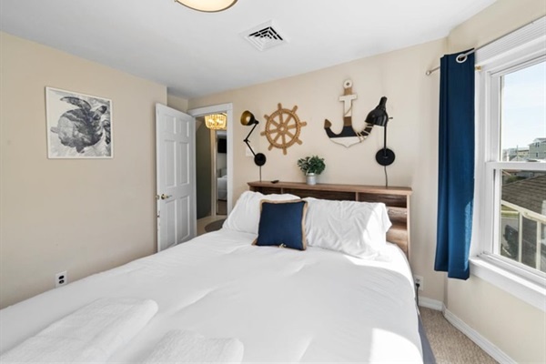 Calm and comfortable—this beach-inspired bedroom is the perfect place to unwind between adventures.