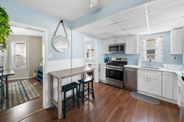 Relax after a day in the sun—this comfy living room invites conversation, board games, or movie nights in.