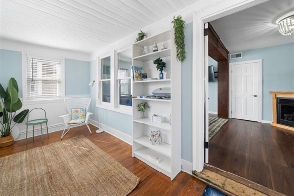 Sunny and inviting, this front room is perfect for morning coffee or curling up with a good book.