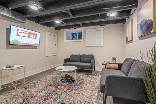 Kick back for movie night or catch the big game—this comfy lower-level lounge has plenty of room for everyone to relax together.