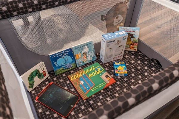 You will find a selection of books and toys to keep the little ones entertained. This thoughtful addition ensures your family has everything needed for a fun and enjoyable stay.