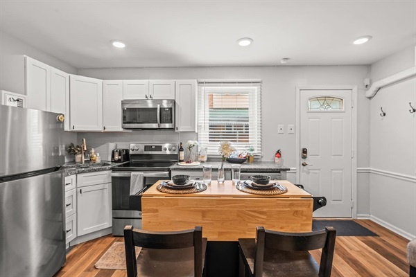 Love the convenience of this thoughtfully designed kitchen! The stylish decor, high-quality appliances, and ample natural light make cooking and dining an absolute pleasure in this inviting space.