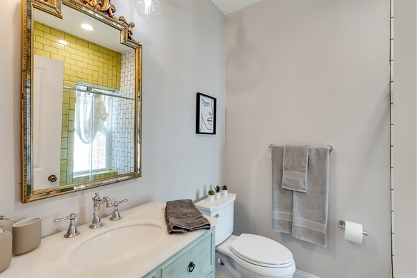 Elegant and inviting—this bathroom pairs modern fixtures with classic details for a boutique-style experience.