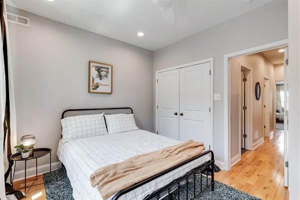 Your cozy corner to recharge—plush bedding, full closet, and an easy flow right to the rest of the home.