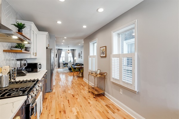 Morning light fills this space—grab a coffee, open the shutters, and start your day in style.