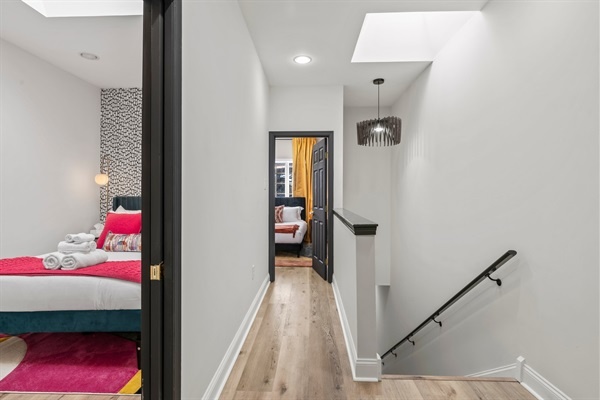 Bright, modern, and full of character — each room offers its own pop of color and cozy retreat just steps apart.