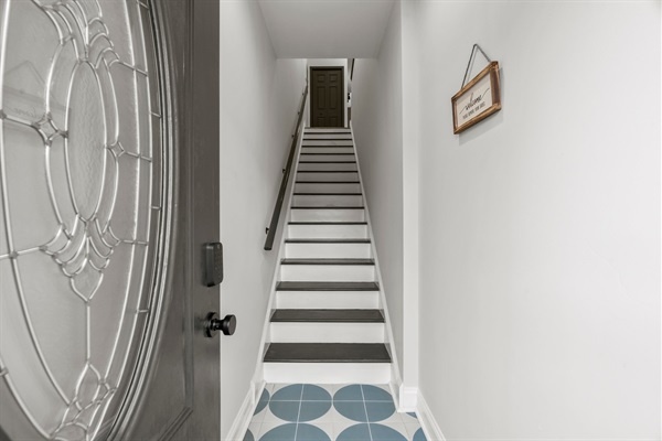 Step inside and feel at home — a warm welcome awaits with thoughtful design and easy access upstairs.