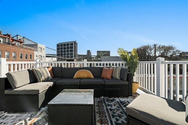 Soak up the sun on this inviting rooftop lounge — the ideal spot to unwind and enjoy open-air comfort.