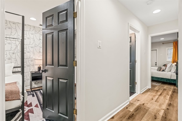 A peek down the hallway into both bedrooms.