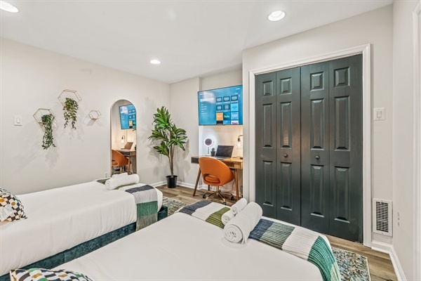 Stream, work, or unwind—this light-filled room blends creativity and comfort for work and play.