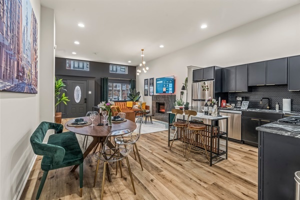 A seamless flow from dining to living to kitchen—modern design and cozy comfort blend beautifully throughout the space.