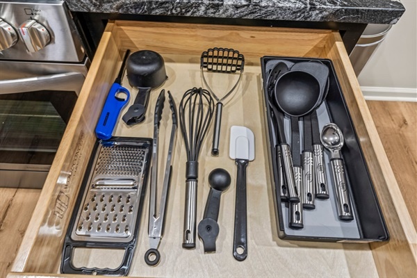 Every tool you need for effortless cooking—this kitchen is stocked for creativity and convenience.