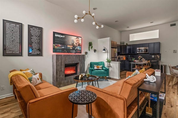 End the day in comfort—curl up on the plush sofa and stream your favorite movie by the fire.