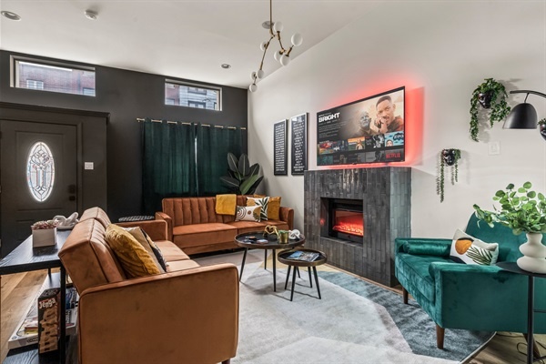 Soak in the natural light and city views from this inviting living area, perfect for coffee or conversation.