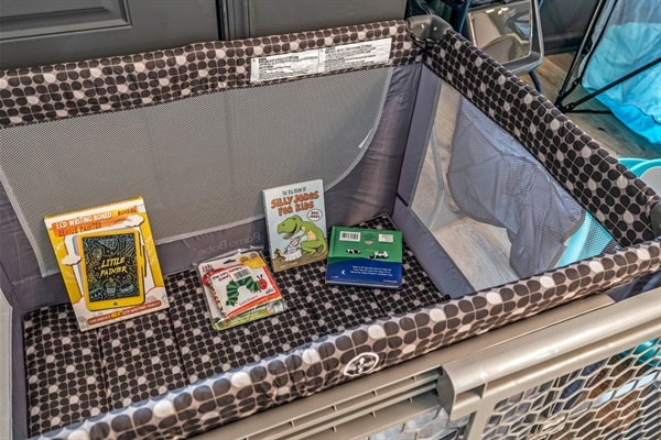 Even the littlest guests are cared for—our playpen comes stocked with books and fun activities for easy family stays.