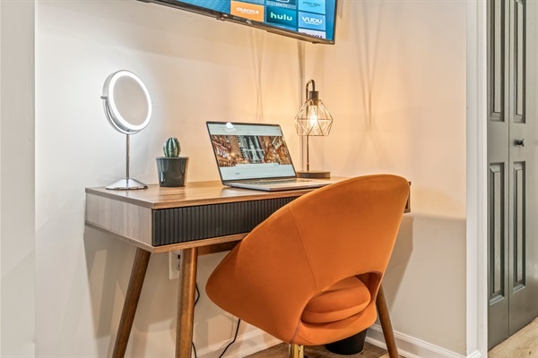 Catch up on work or plan your Philly adventures at this sleek, well-lit desk designed for productivity and comfort.