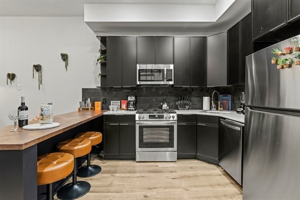 Pull up a stool and keep the cook company. It's the perfect spot for morning coffee.