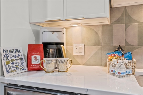 Wake up to a delightful coffee station complete with premium coffee and snacks. The convenient setup allows you to start your day with ease and enjoy a relaxing morning routine.
