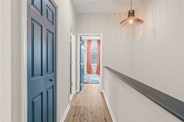Your bright and airy hallway leading to your bedroom