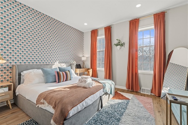 Retreat to a bright and airy bedroom that combines comfort with a touch of elegance. The soothing decor and plush bedding ensure a restful night's sleep, making it hard to leave the bed in the morning!