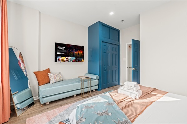 Your bedroom comes equipped with plenty of closet space and your own smart tv!