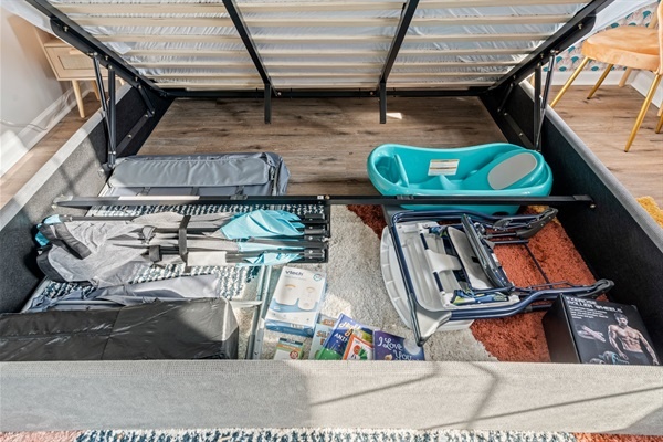 Discover the hidden storage under the bed, stocked with all the baby essentials you might need. You will love the convenience of having strollers, toys, and more, ensuring a stress-free stay for families.