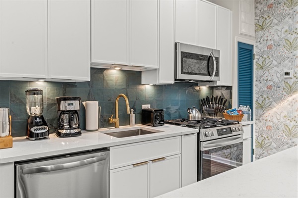 The kitchen is a chef's dream, with high-end appliances, ample counter space, and stylish finishes, making meal preparation a pleasure during your stay.