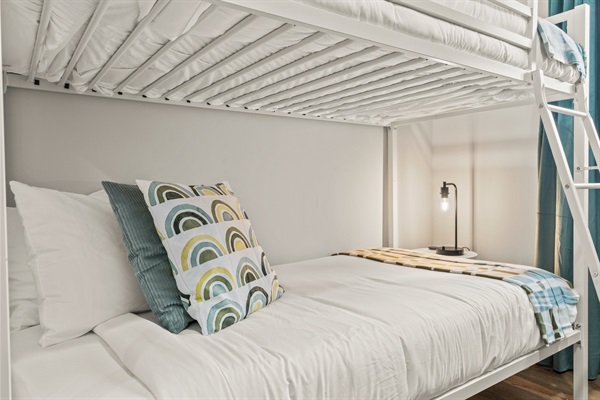 Curl up with a good book or movie in this peaceful nook designed for restful sleep and laid-back evenings.