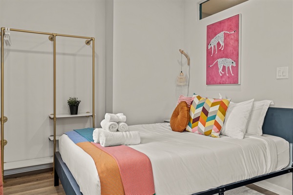 Bright, modern, and inviting — this bedroom pairs sleek design with cozy comfort for a rejuvenating stay.