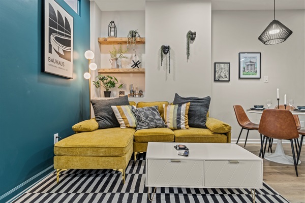 Bright, artful, and inviting — this living space balances color and comfort for the perfect Philly vibe.