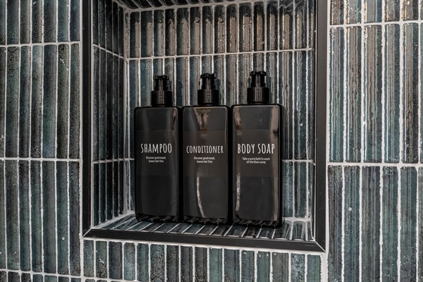 Luxury bath essentials await—refresh with premium shampoo, conditioner, and body wash for a spa-like feel.