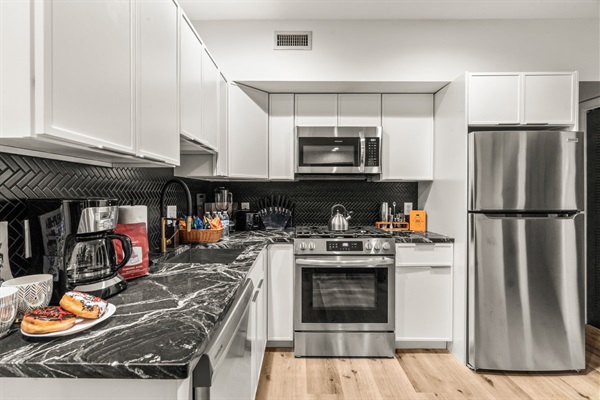 Start your day right with our fully stocked coffee bar, premium appliances, and thoughtful extras.