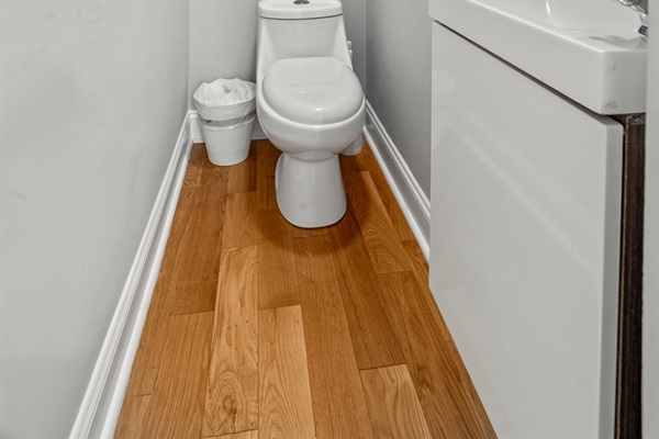 Your powder room located off the living space is very convenient.