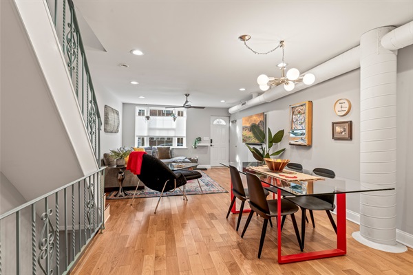 Gather at the bold dining table for home-cooked meals, work sessions, or long chats over coffee.