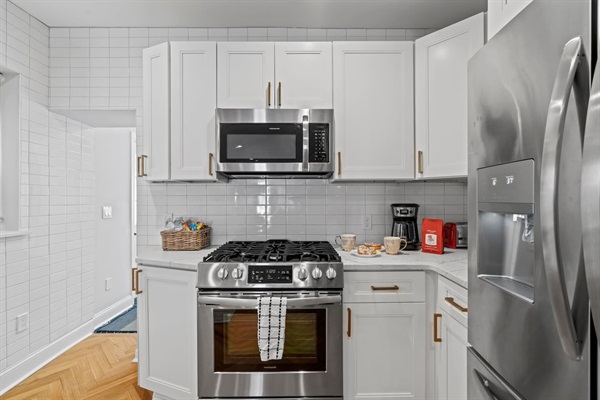 You will love the efficient layout and modern amenities of this beautiful kitchen, perfect for culinary adventures or a quick breakfast before a day of exploring.
