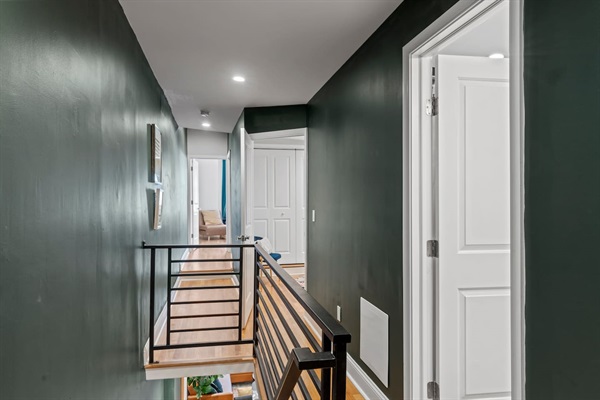 Appreciate the sleek and modern hallway that connects the home. The contemporary design with elegant accents ensures a pleasant and stylish transition between rooms, making every step through the house a delight.